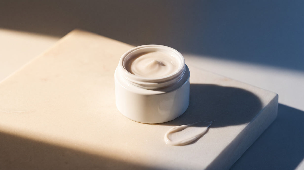 Peptide cream for day and night — lightweight peptide moisturiser in an open jar in morning and evening light